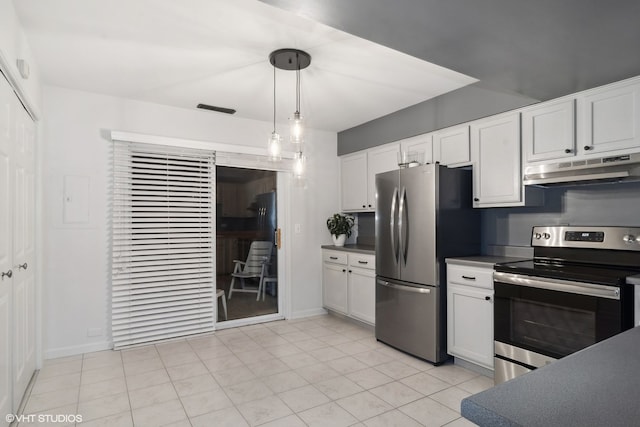 kitchen featuring decorative light fixtures, white cabinetry, and appliances with stainless steel finishes