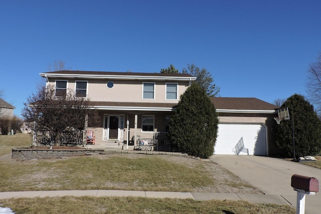 front of property with a porch, a garage, and a front yard