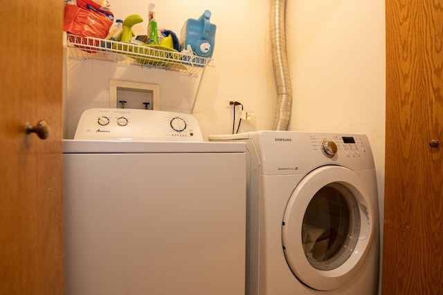 laundry room featuring independent washer and dryer