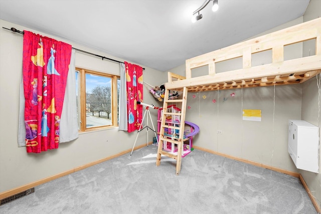 bedroom with carpet, visible vents, and baseboards