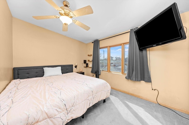 bedroom featuring carpet flooring, baseboards, and ceiling fan