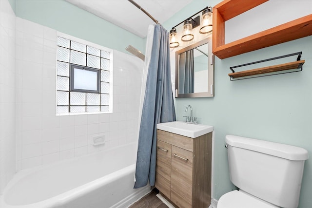 full bathroom featuring toilet, vanity, and shower / bath combo