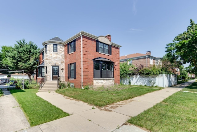 view of front facade featuring a front yard