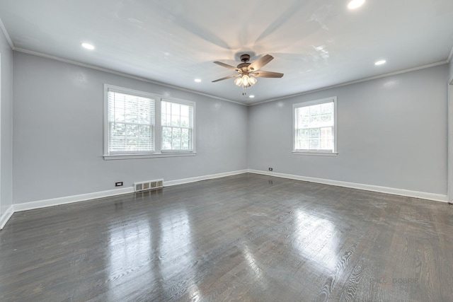 unfurnished room with dark hardwood / wood-style floors, ceiling fan, and crown molding