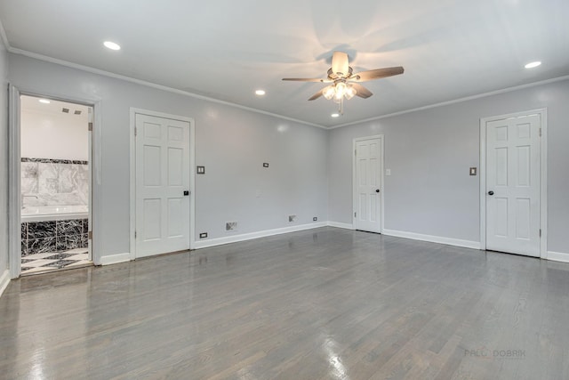 unfurnished room with dark hardwood / wood-style flooring, ceiling fan, and crown molding