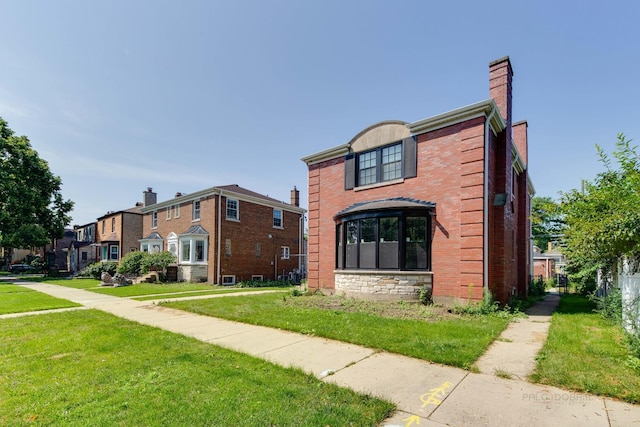 view of front of home featuring a front yard