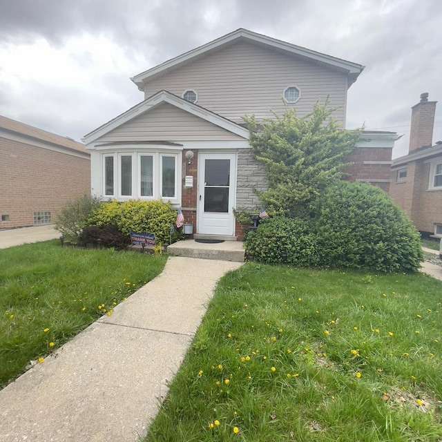 view of front of house with a front yard