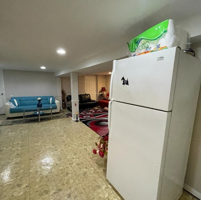 kitchen featuring white fridge