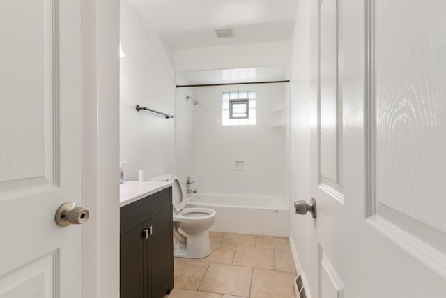 full bathroom featuring tile patterned flooring, vanity, tub / shower combination, and toilet