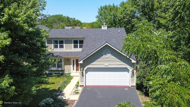 view of front of property with a garage