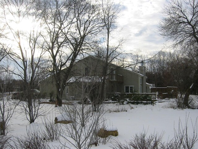 view of snow covered property