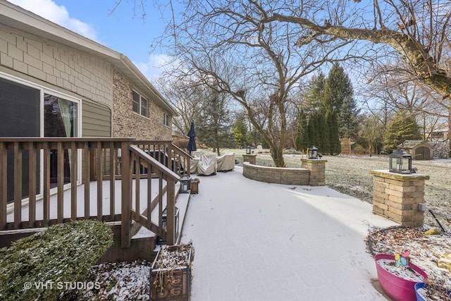 exterior space with a patio and a wooden deck