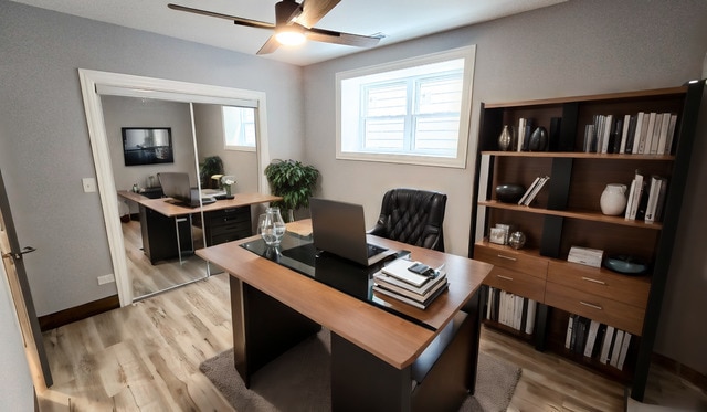 home office featuring ceiling fan and light hardwood / wood-style floors