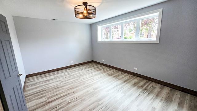 empty room featuring light hardwood / wood-style flooring