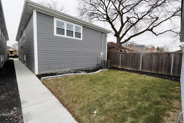 view of property exterior with a yard