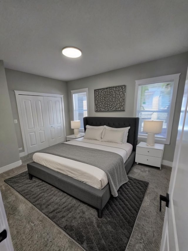 carpeted bedroom with a closet