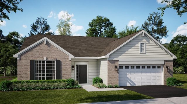 view of front facade featuring a front yard and a garage