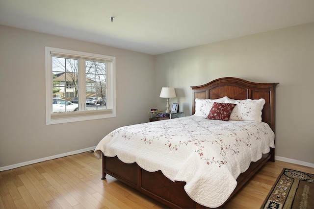 bedroom with light hardwood / wood-style flooring