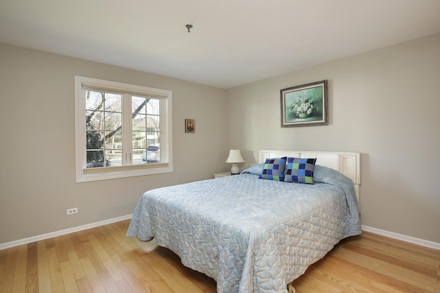 bedroom featuring light wood-type flooring