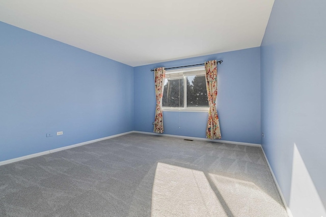 empty room with carpet floors