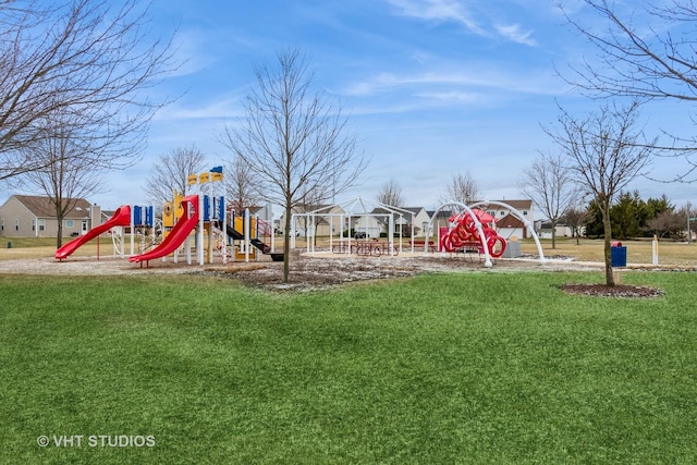 view of jungle gym featuring a lawn