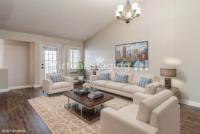 living room featuring a notable chandelier, dark hardwood / wood-style floors, and vaulted ceiling