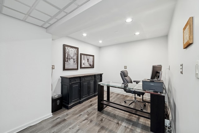 home office featuring light hardwood / wood-style floors