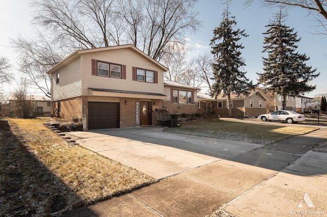 tri-level home featuring a garage