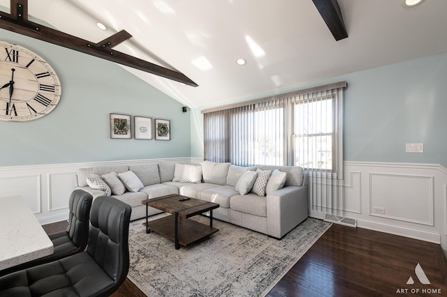 living room with vaulted ceiling with beams and dark hardwood / wood-style floors