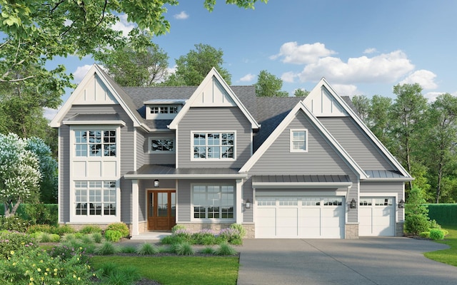 view of front facade featuring a garage and french doors