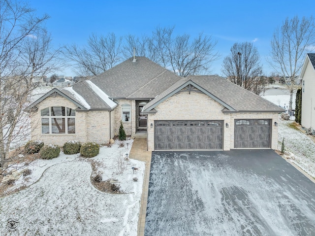 french country home with a garage