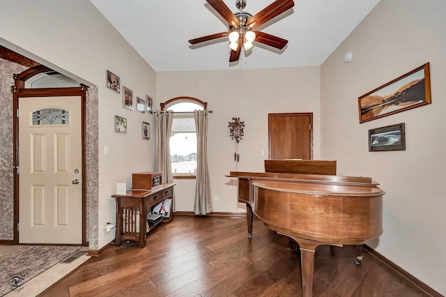 misc room featuring dark hardwood / wood-style floors and ceiling fan