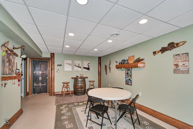 dining space featuring a paneled ceiling