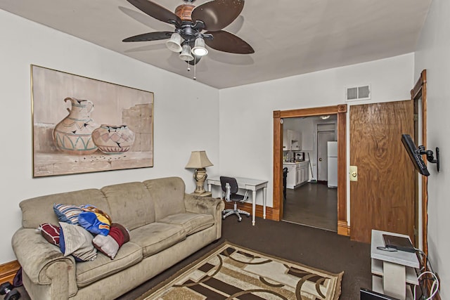 living room featuring ceiling fan