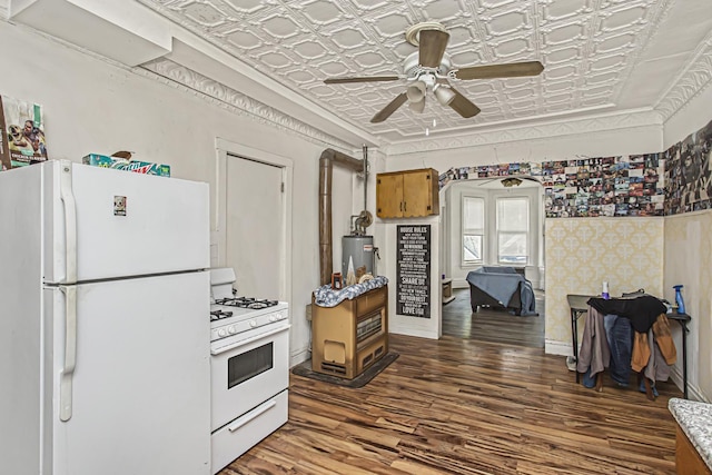 kitchen with ceiling fan, dark hardwood / wood-style flooring, gas water heater, and white appliances