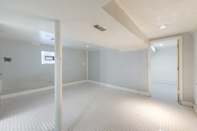 basement featuring tile patterned flooring