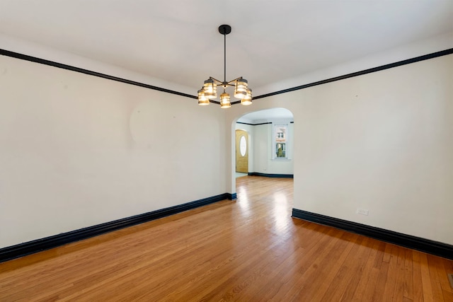 unfurnished dining area featuring light wood-type flooring