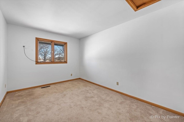 view of carpeted spare room