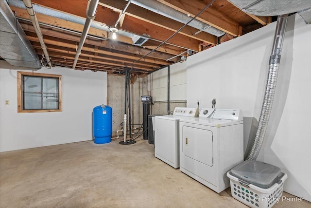 laundry area with washing machine and clothes dryer