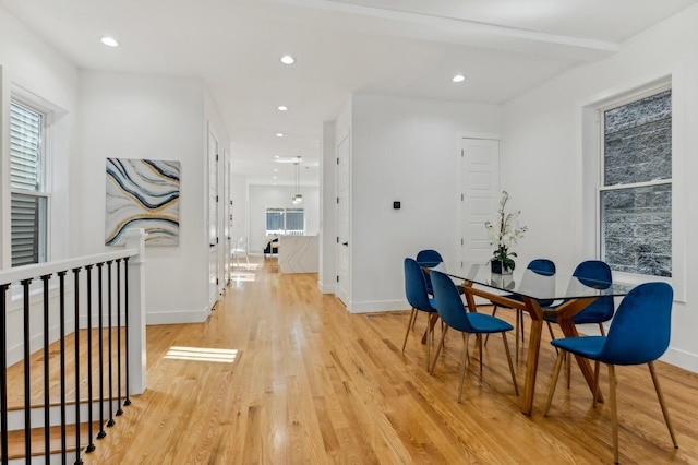 dining area with light wood-type flooring