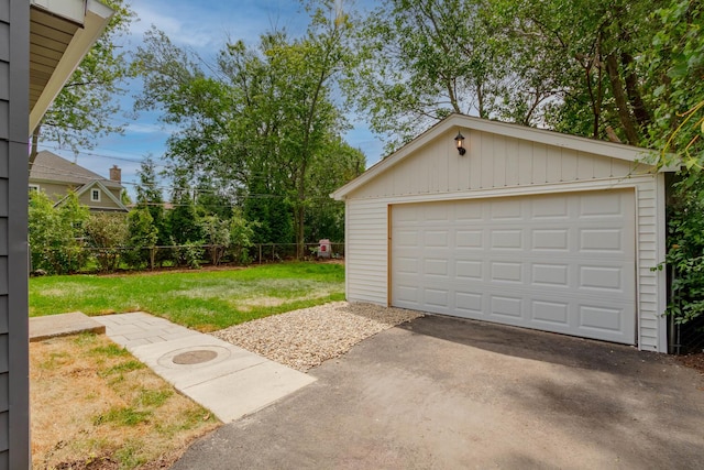 garage with a yard