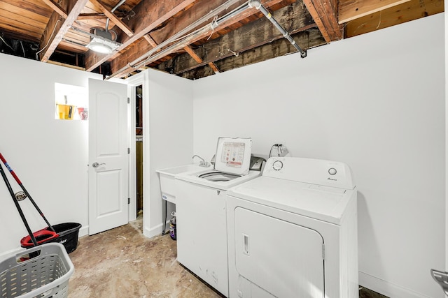 laundry room featuring independent washer and dryer