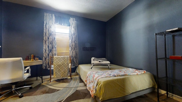 bedroom with lofted ceiling