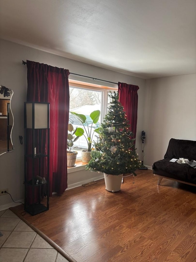 living area featuring hardwood / wood-style flooring