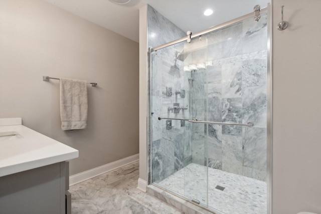 bathroom with vanity and an enclosed shower