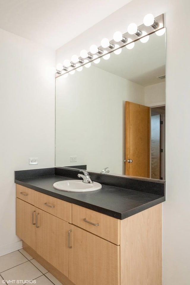 bathroom with vanity and tile patterned floors