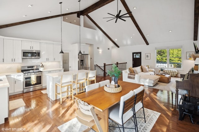 dining space featuring beam ceiling, light hardwood / wood-style flooring, high vaulted ceiling, and ceiling fan