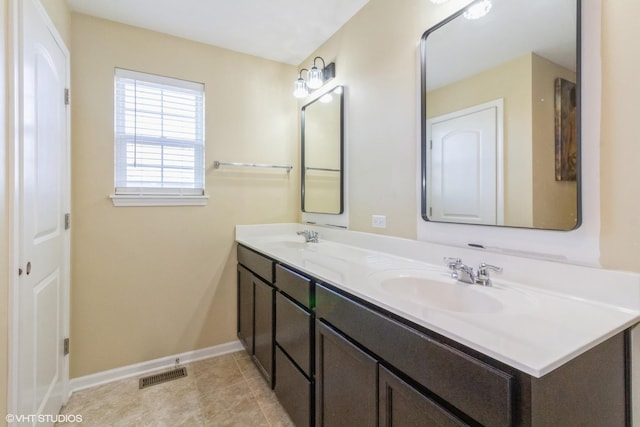 bathroom featuring vanity