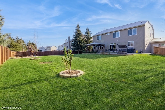 view of yard featuring a gazebo and a patio