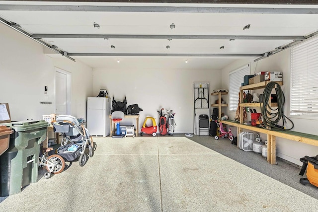 garage with white fridge